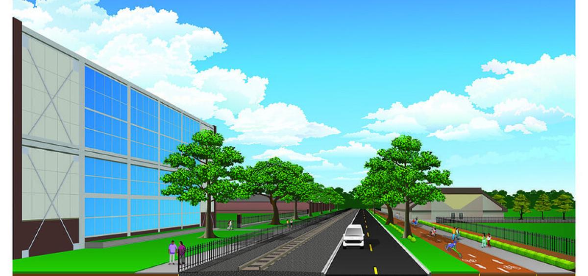 Illustration showing proposed changes to Washington Way, including cars on a two-lane roadway, bicyclists on a two-lane bike path; and pedestrians on a sidewalk.