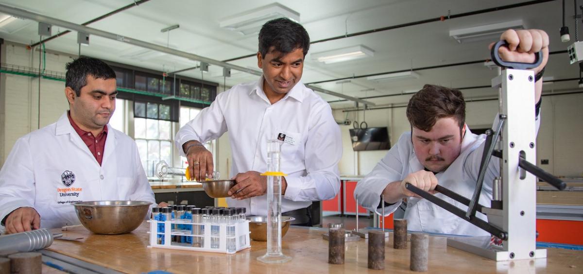 Akula, center, and students in lab (photo by Johanna Carson)