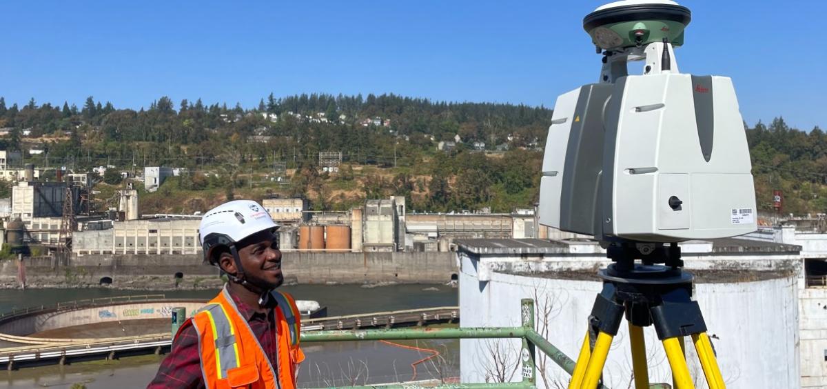 OSU geomatics student Kenneth Kenney scanning an industrial site near Willamette Falls in Oregon City, Oregon..