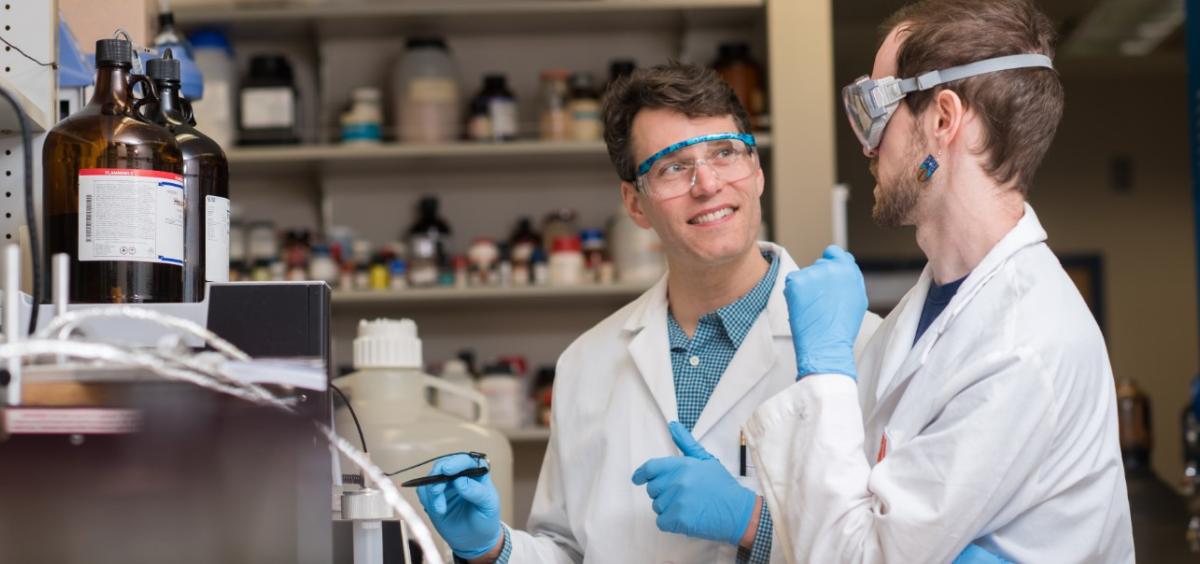 Ryan Mehl, left, in lab