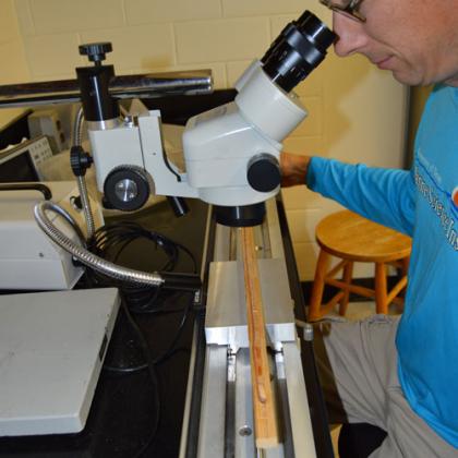 Bryan Black measures growth rings in tree cores to learn about past climate regimes