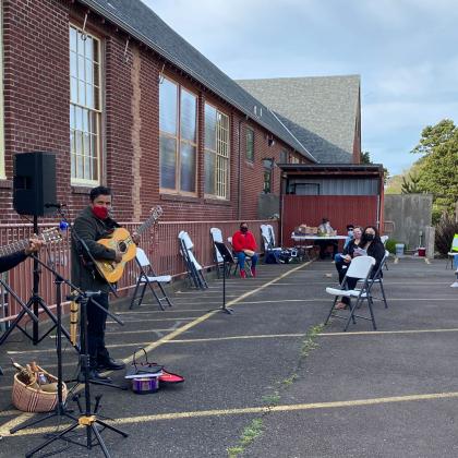 A band plays at a vaccine clinic in Lincoln City that was hosted by the Olalla Center for Latinx and Indigenous community members. OSU students and Extension employees were on hand to support the clinic.