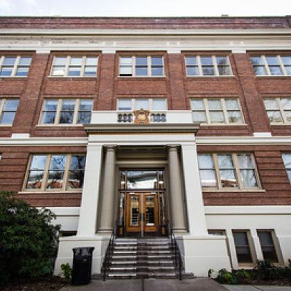 Stock photo of Milam Hall, classic looking red-brick building