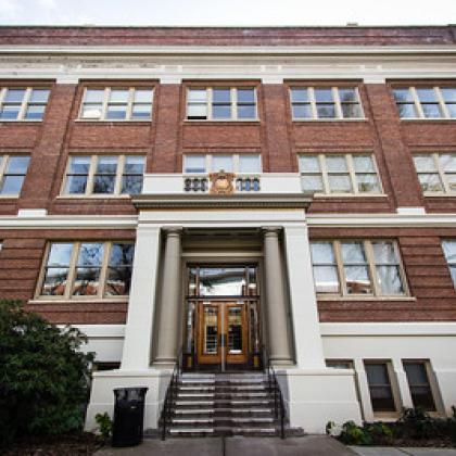 Stock image of Milam Hall, red-brick building at OSU