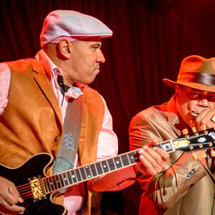 Ronnie Baker Brooks and Billy Branch perform in the Chicago blues style