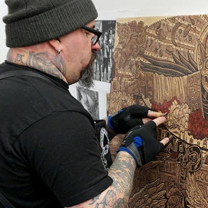 Printmaking artist Tom Huck at work