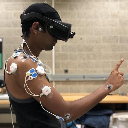 Subject wearing motion sensors and VR headset