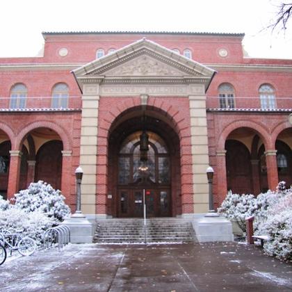 Stock image of the Women's Building on OSU Campus, red-brick with multiple arches.