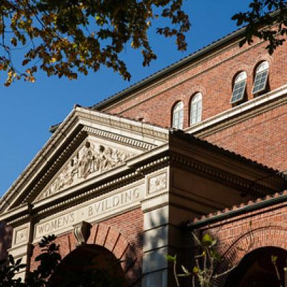 Looking up at the red-brick front of the Women's Building on OSU campus